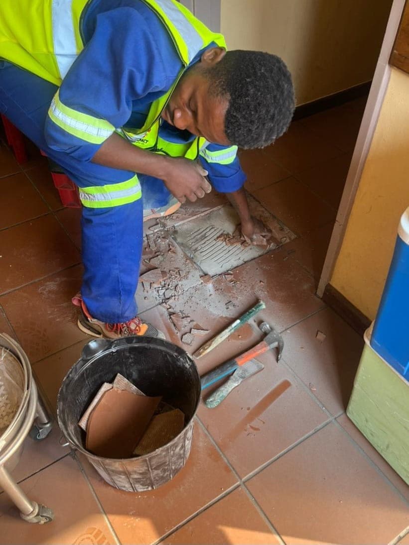 Hospitality renovation, tile repair in progress