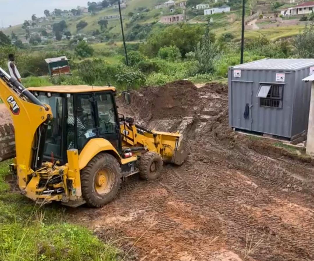 TLB excavator on an Afripact earthworks site